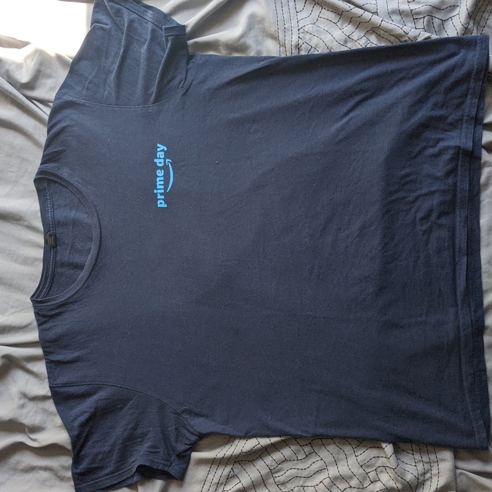 Large navy blue Amazon t-shirt.